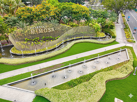 FILINVEST Mimosa Plus Leisure City along M.A. Roxas Highway, framed by open green spaces and key access routes within Clark.