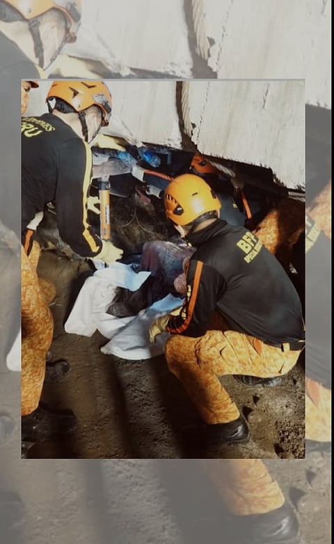 Rescue teams work carefully amid debris at Sector 1, where the 6th fatality was recovered early Friday and where knocking sounds were detected hours later, raising hopes of possible survivors.