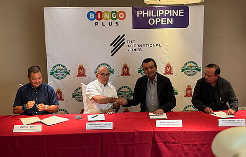 NATIONAL Golf Association of the Philippines chairman Martin Lorenzo (second from left) and Manila Southwoods chairman Bob Sobrepeña seal the partnership for the hosting of the Philippine Open-International Series at Manila Southwoods in Carmona. Also in the photo are NGAP secretary general Bones Floro (left) and NGAP director Rafael Perez De Tagle.