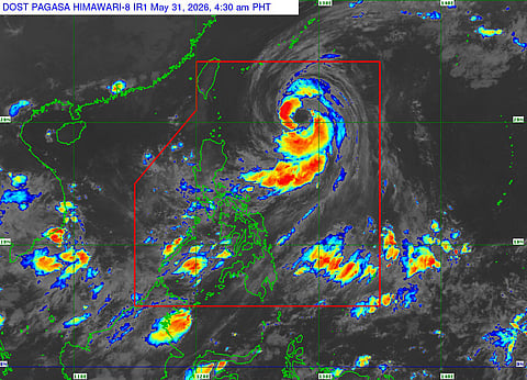 Typhoon Domeng strengthens as it moves north-northwest over waters east of Batanes