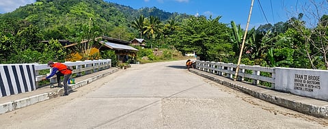 PERSONNEL from the DPWH-Sultan Kudarat 2nd District Engineering Office conduct a bridge repainting activity in Barangay Datu Wasay, Kalamansig, Sultan Kudarat, as part of the agency’s ongoing routine maintenance program.