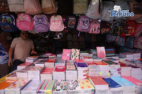(June 01 2026)  Vendors arrange their selling school supplies at a low price at Commonwealth Market in Quezon City, on Monday June 1 2026. Ahead of the year 2026 school opening. Photo/Analy Labor