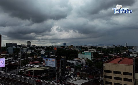 Dark clouds loom over Metro Manila and nearby provinces on Monday as Typhoon Domeng (Jangmi) continues to enhance the southwest monsoon, bringing rains to parts of the country. PAGASA said the storm may exit the Philippine Area of Responsibility by Monday night. | Photo by Analy Labor