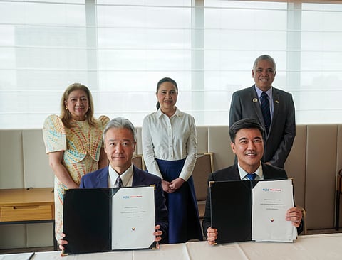 Marubeni Corporation Senior Operating Officer Chiba Seijiro, and BCDA President and CEO Joshua M. Bingcang signed a memorandum of understanding to explore opportunities in developing power, water, and utility infrastructure in New Clark City.  (standing from L-R) Philippine Ambassador to Japan Mylene De Joya Garcia-Albano, Department of Trade and Industry Secretary Ma. Cristina A. Roque, and Department of Finance Undersecretary Atty. Rolando Ligon Jr. witnessed the signing. 