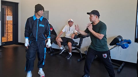 KENNETH Llover gets precious pointers from his chief handler Gerry Peñalosa in the final days leading up to his showdown with Michael Angeletti in their IBF bantamweight title elimination match this Saturday in Tokoname, Japan.