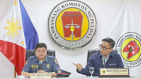NATIONAL Police Commission Commissioner Rafael Calinisan (right) presents to the public Police Corporal Simeon Suan who was involved in the viral video showing the forced handcuffing of a senior citizen driver in Taguig City.