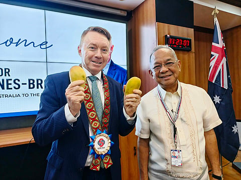 Australian Ambassador to the Philippines Marc Innes-Brown shows off some of the mangoes he received from SBMA Chairman and Administrator Eduardo Jose L. Aliño during the envoy's visit to the Subic Bay Freeport on 02 June 2026.
