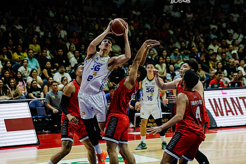 CALVIN Oftana of TNT puts his late-game blunder behind as he focuses on Game 2 of their PBA Commissioner’s Cup best-of-seven finals series against Barangay Ginebra on Friday.
