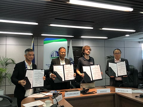 CLEAN THE PHILIPPINES: Holding the Memorandum of Agreement for the five-year Manila Bay region waste rehabilitation (from left to right) were DENR National Capital Region Assistant Regional Director for Technical Services Engr. Henry Palcis, DENR Undersecretary for Policy, Planning and International Affairs Atty. Jonas Leones, The Ocean CleanUp Founder and CEO Boyan Slat and Energies PH President Mr. Antonio Ver. The ceremonial signing was held at DENR Central Office, Diliman, Quezon City on June 4, 2026.  (PHOTOGRAPHED by Sean Magbanua for the DAILY TRIBUNE). 
