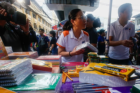 Department of Trade and Industry (DTI) Secretary Ma. Cristina Roque inspects school supplies during a price and supply monitoring operation at Taft Avenue Extension in Pasay City on 06 June 2026. Secretary Roque reported that local retailers are strictly complying with the agency's suggested retail prices (SRP) ahead of the upcoming school year, with some vendors even selling goods below the SRP to ease the financial burden on consumers.