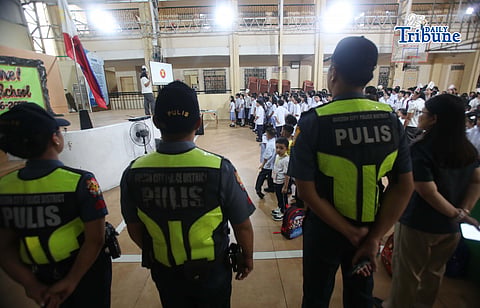 (June 08 2026) Quezon City Police District (QCPD) station 10 commander speaks to encourage the students to study well and be kind to others, at Marcelo H del Pilar Elementary School in Kamuning Quezon City on Monday during the first day of School year 2026. The Philippine National Police said they deployed police presence nationwide aimed to prevent crimes such as bullying, theft, and gang activities near campus perimeters. Photo/Analy Labor