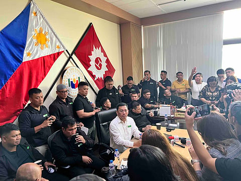 The 18-ex marines with lawyer Levi Baligod face the media on Monday in the office of Senator Robin Padilla.