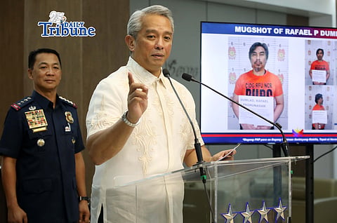 (June 09 2026) DILG Secretary Jonvic Remulla with PNP Chief Melencio Nartatez,  show the mug shot of Police Lt. Col. Rafael Dumlao the government's highest-ranking suspect in the abduction and murder of South Korean businessman Jee Ick Joo in 2016, during the press conference at Camp Crame in Quezon City, following of the arrest of the suspect. Photo/Analy Labor