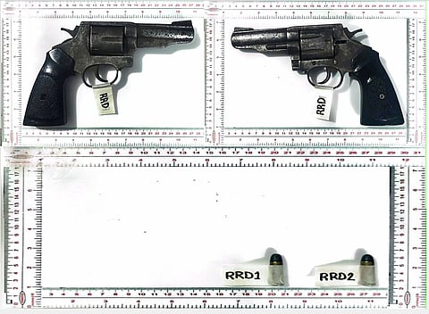 Taguig traffic stop yields unlicensed gun, teen rescued 