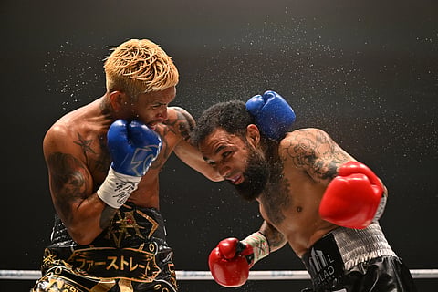 JOHNRIEL Casimero (left) delivers a monster performance — a fourth-round stoppage of Mexican Luis Nery over the weekend in Nagoya, Japan.