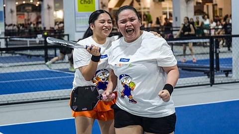 CHRISTIE Angelie Villarante and Joey Ann Ramos celebrate after conquering the women’s newbie event of the 1st ArenaPlus-KaTribu Pickleball Tournament on Friday at The Dink Lab Elite inside All Home in Kawit, Cavite.
