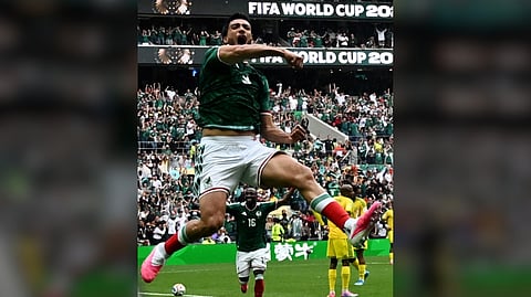 RAUL Jimenez celebrates after scoring a header that sealed Mexico’s 2-0 victory over South Africa in the opening salvo of the FIFA World Cup in Mexico City.