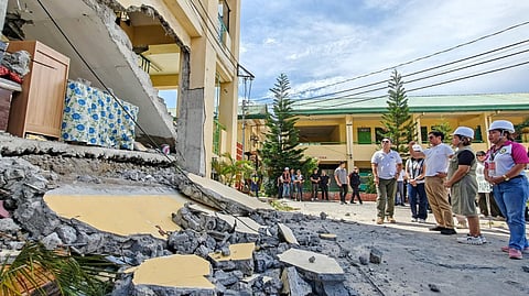 CLASSES must go on Undeterred by earthquake damage, President Marcos (third from right) inspects General Santos City National High School to fast-track rehabilitation of school facilities, even as alternative learning modalities keep on schedule students education.