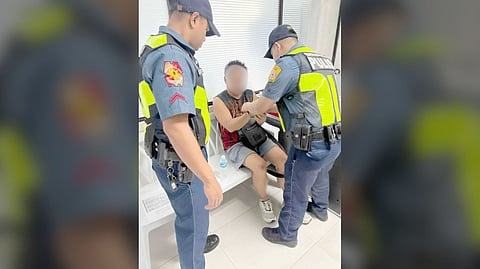 A National Police Commission employee is arrested by Quezon City police after allegedly drawing a firearm and threatening a TNVS driver during a road rage incident in Mandaluyong City.