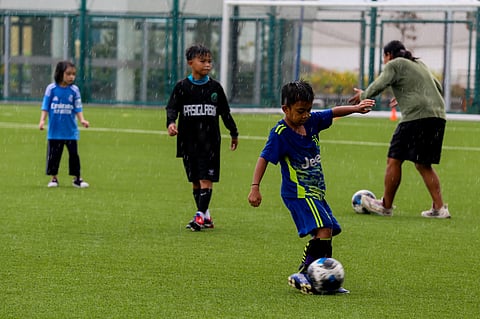 Children participate in a football clinic at SM Mall of Asia’s Adidas Football Park in Pasay City on 13 June 2026. Held as part of the Pinoy Football Fiesta, the event was organized in partnership with the Embassies of Canada, Mexico and the United States to highlight the power of sports in uniting nations, cultures, and people.