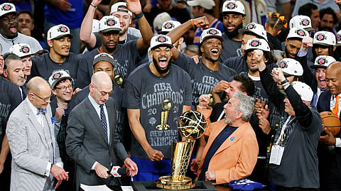 THENew York Knicks celebrate after ending a 53-year championship drought with a 94-90 victory over the San Antonio Spurs in Game 5 of the NBA Finals at the Frost Bank Center in San Antonio, Texas. 