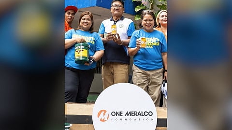 REPRESENTATIVES of the One Meralco Foundation and Meralco employee volunteers turn over LED lights, paint and cleaning materials to personnel of Bagong Ilog Elementary School in Pasig City as part of Brigada Eskwela 2026.