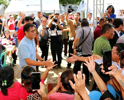 President Ferdinand Marcos Jr., together with DSWD Secretary Gatchalian (at the back), visited families temporarily staying at the Tent City in Glan, Sarangani on Monday, June 15. After the visit, PBBM and Gatchalian assessed DSWD Mobile Storage Unit (MSU) to ensure the readiness of family food packs, non-food items, and other relief supplies for distribution. (PHOTO from DSWD).
