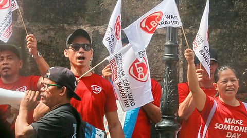 MEMBERS of a courier and logistics workers’ union rally outside the Department of Labor and Employment in Intramuros, Manila, calling for dialogue amid a deadlock in collective bargaining negotiations.