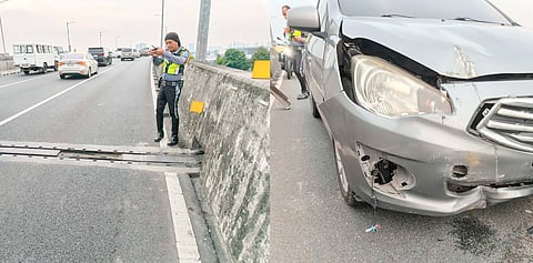 A Philippine National Police-Highway Patrol Group officer documents the expansion joint area along Skyway Stage 3 after a detached roadway cover allegedly struck a passing vehicle. The incident, which occurred on 13 June along the southbound lane, left a car damaged and prompted an inspection of the affected section.