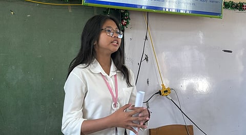 AYESHA Denize Biong presenting and defending a research project in a demonstration of strong communication skills, critical thinking and confidence in sharing her work in March 2026 in Andres Bonifacio Integrated School, Mandaluyong City. 