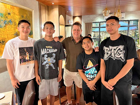 MACKY Pelegrino, Matt Cayetano, JM Sanoria and Rhysus Bajetin bump into Gilas Pilipinas coach Tim Cone shortly after announcing that they will be moving to De La Salle Zobel for Season 89 of the UAAP juniors basketball tournament.