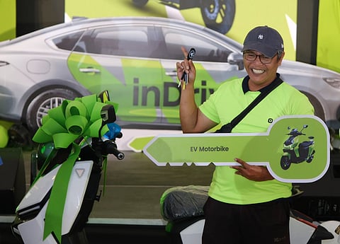 WINNER receives an EV motorbike as inDrive awards major prizes to top-performing partner drivers under its Platinum Driver Campaign.