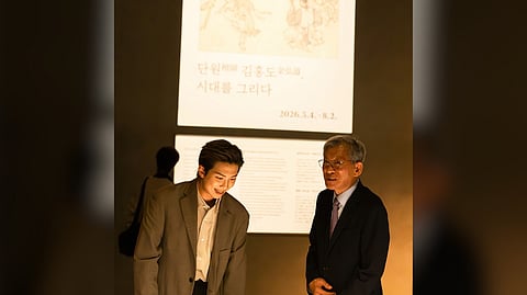 RM of BTS and National Museum of Korea director You Hong June. 