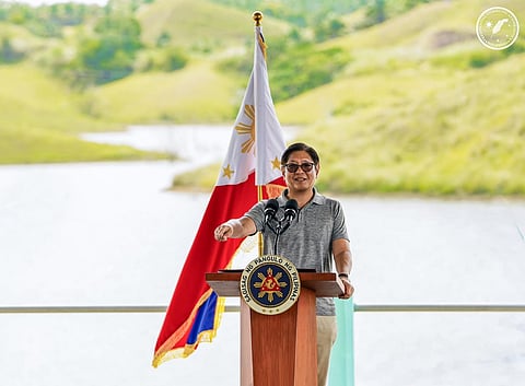 Behind President Ferdinand Marcos Jr. is the Mabini-Cayacay Small Reservoir Irrigation Project (SRIP) in the municipalities of Mabini and Alicia, Bohol.