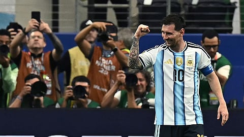 LIONEL Messi celebrates after scoring his record-breaking 18th goal during Argentina’s 2-0 win over Austria in the preliminaries of the FIFA World Cup on Monday. 