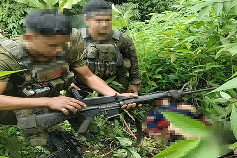 TROOPS from the Philippine Army’s 8th Infantry Battalion inspect high-powered firearms recovered after a five-minute firefight with communist insurgents in Malaybalay City. The encounter, prompted by a civilian tip, resulted in the death of Romeo Mampinsahan, a commanding officer of the North Central Mindanao Regional Committee. Army officials noted that his neutralization leaves the regional rebel leadership heavily fractured.