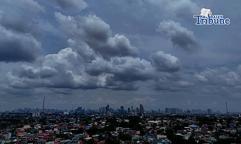 (June 23 2026) Dark clouds which may bring heavy rain hover over a residential area as seen from Quezon City on Tuesday June 23 2026. According to the PAGASA Super typhoon Francisco weakened into a typhoon Tuesday morning as it recurved east of the Batanes-Babuyan area, The typhoon could pull the habagat toward Luzon by midweek, bringing scattered rains over the western section of the island, including Metro Manila. Photo/Analy Labor