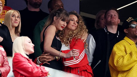 Singer Taylor Swift and Actress Blake Lively hug prior to Super Bowl LVIII between the San Francisco 49ers and Kansas City Chiefs at Allegiant Stadium on 11 February, 2024 in Las Vegas, Nevada. 