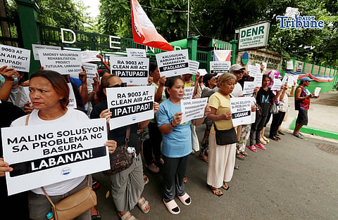 (June 23 2026) Samahan ng Mamamayan-Zone One Tondo, Inc. (SM-ZOTO) Tondo, Malabon, and Navotas chapters members, stage a protest at the Department of Environment and Natural Resources DENR office in Quezon City on Tuesday, June 23, 2026, to oppose the 10-hectare Smokey Mountain Rehabilitation Project that will facilitate the construction of a Waste-to-Energy Facility legacy waste site situated in Tondo, Manila. Photo/Analy Labor
