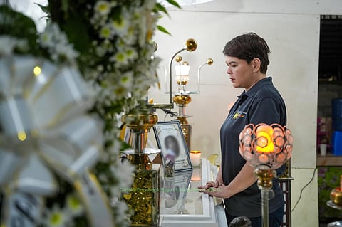 Duterte visits wake of 3 slain in Tacloban school shooting