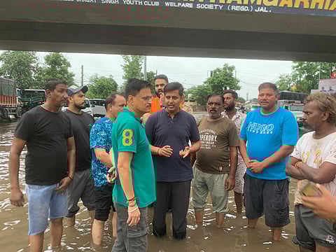 DC Himanshu Agarwal inspects water-logged areas in Jalandhar, commending workers’ efforts after heavy rain.