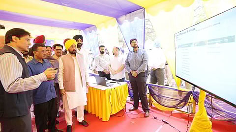 CM Mann and Kejriwal at Punjab Faceless RTO inauguration