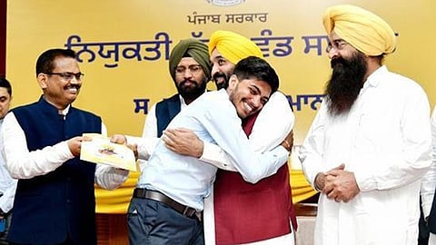 CM Bhagwant Mann hugging student
