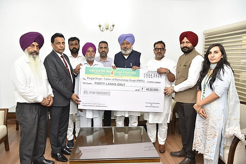 Harpal Cheema Presents ₹40 Lakh Insurance Cheque