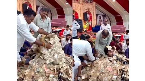 Viral video of cash being thrown at Gujrat Bhajan program