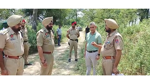 Police at the site of encounter