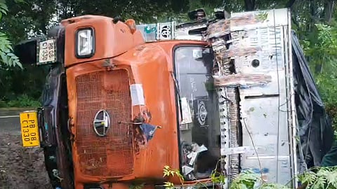 Truck overturned after collision
