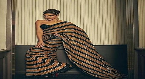 Deepika walks Cannes red carpet in Sabyasachi sari inspired by Royal Bengal tiger