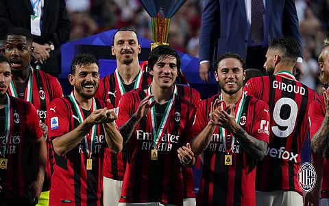 AC Milan roar back to win Serie A title after 11 years