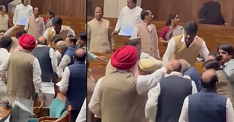 Lok Sabha Security Breach: MPs throw punches & kick at intruder with 'smoke pistol', Video Viral